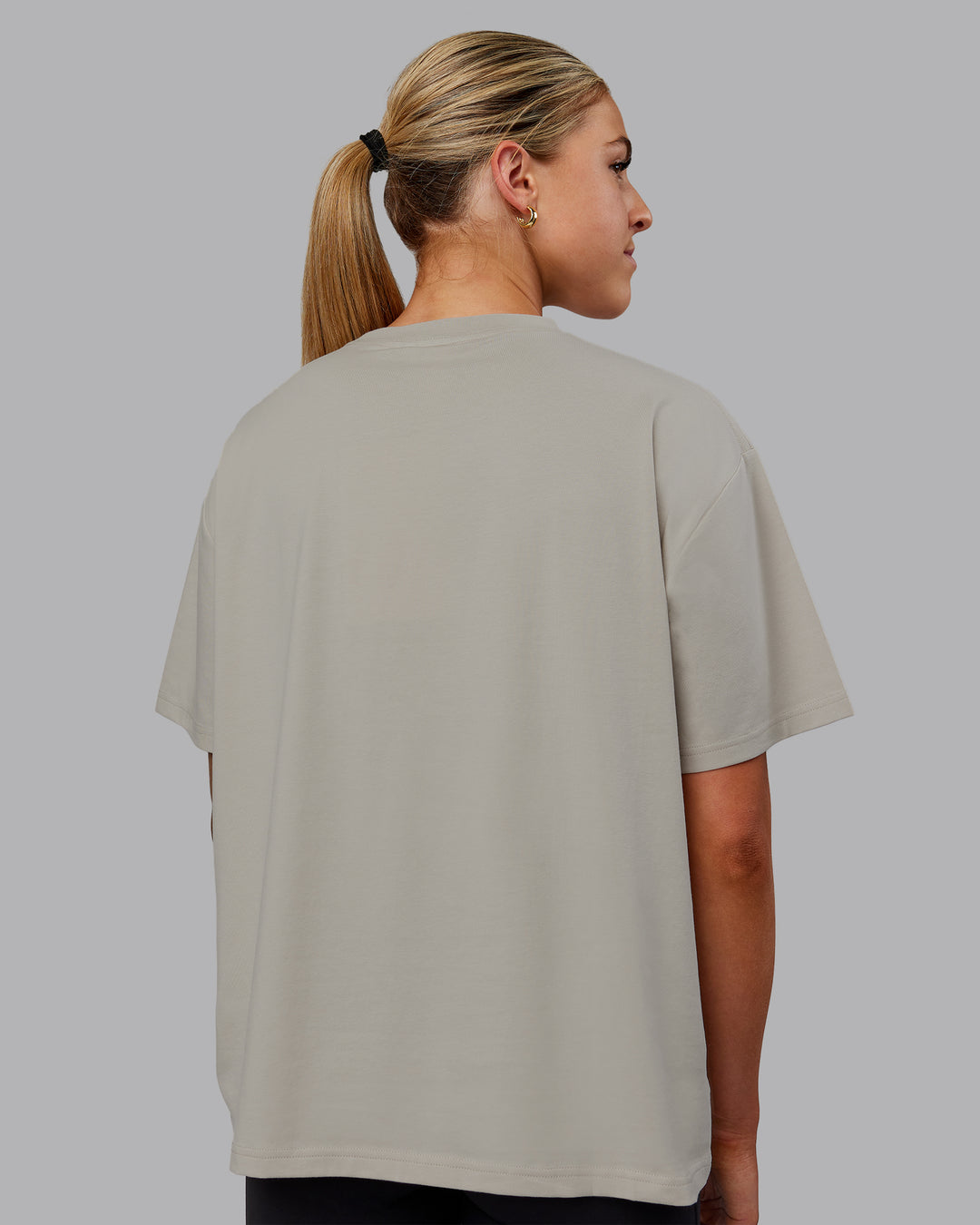 Woman wearing Go-To FLXCotton Oversized Tee - Shale Beige