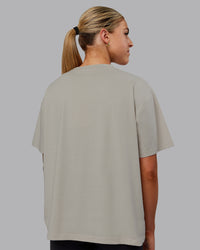 Woman wearing Go-To FLXCotton Oversized Tee - Shale Beige
