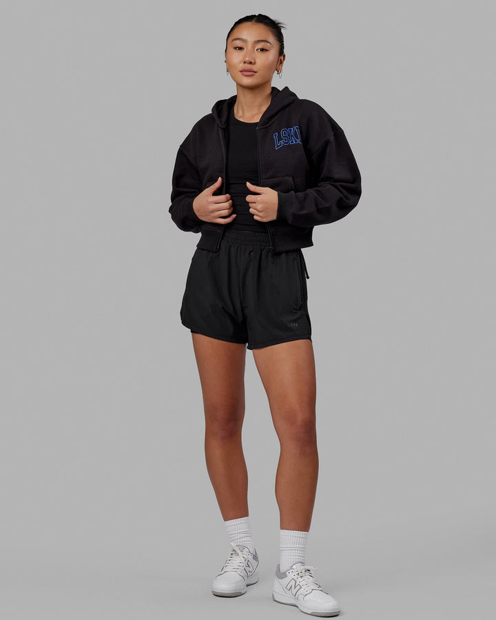 Woman wearing Guild Cropped Hoodie - Black-Power Cobalt