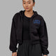 Woman wearing Guild Cropped Hoodie - Black-Power Cobalt