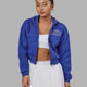 Woman wearing Guild Cropped Hoodie - Power Cobalt-White