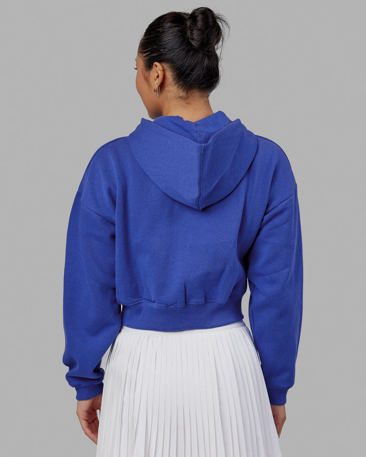 Woman wearing Guild Cropped Hoodie - Power Cobalt-White