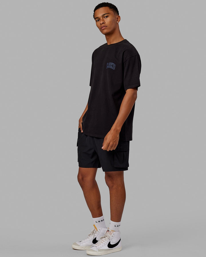 Man wearing Unisex Guild Heavyweight Tee Oversize - Black