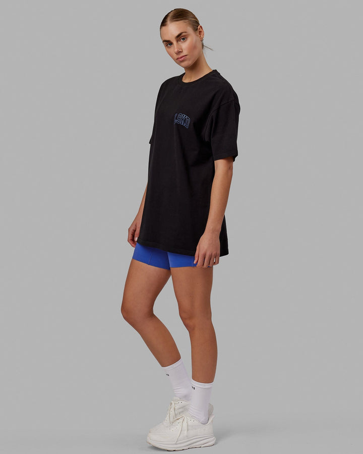 Woman wearing Unisex Guild Heavyweight Tee Oversize - Black