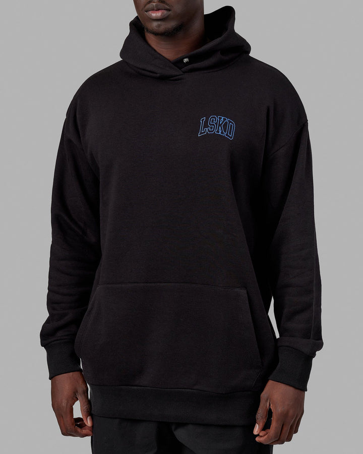 Man wearing Unisex Guild Hoodie Oversize - Black