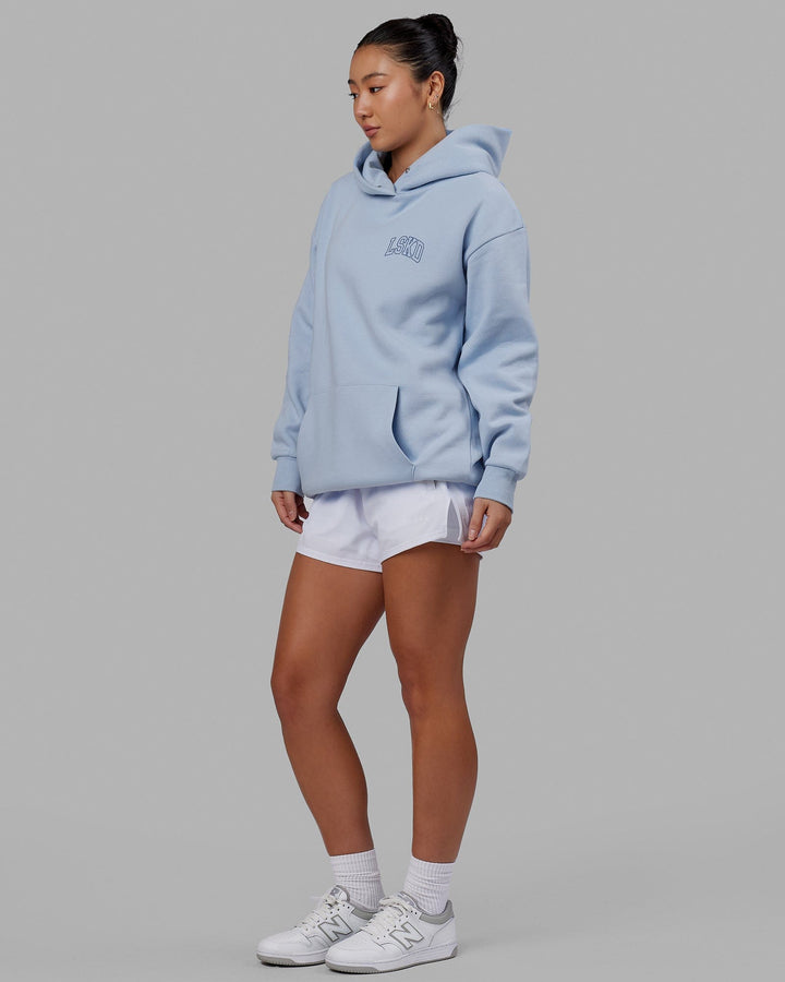 Woman wearing Unisex Guild Hoodie Oversize - Windsurfer