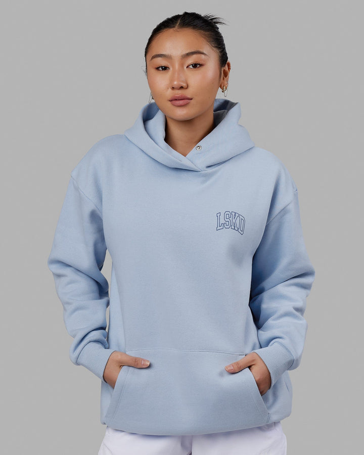 Woman wearing Unisex Guild Hoodie Oversize - Windsurfer