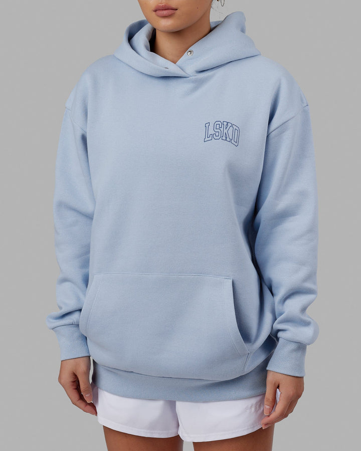 Woman wearing Unisex Guild Hoodie Oversize - Windsurfer