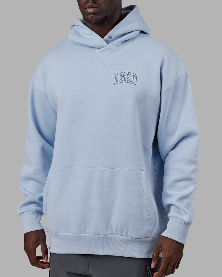Man wearing Unisex Guild Hoodie Oversize - Windsurfer