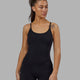 Woman wearing Helix Active Bodysuit - Black
