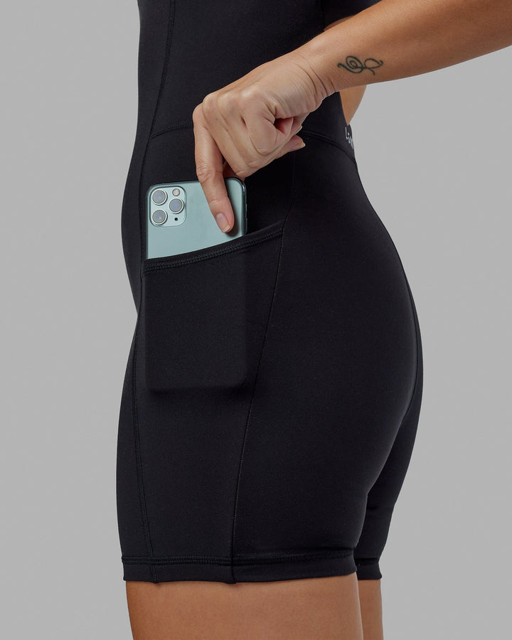 Woman wearing Helix Active Bodysuit - Black