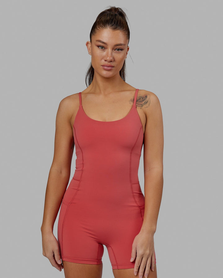 Woman wearing Helix Active Bodysuit - Mineral Red