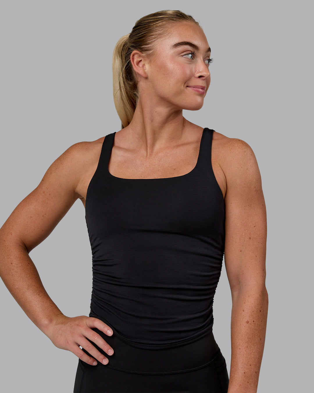 Woman wearing Ignite Scrunch Side Tank - Black