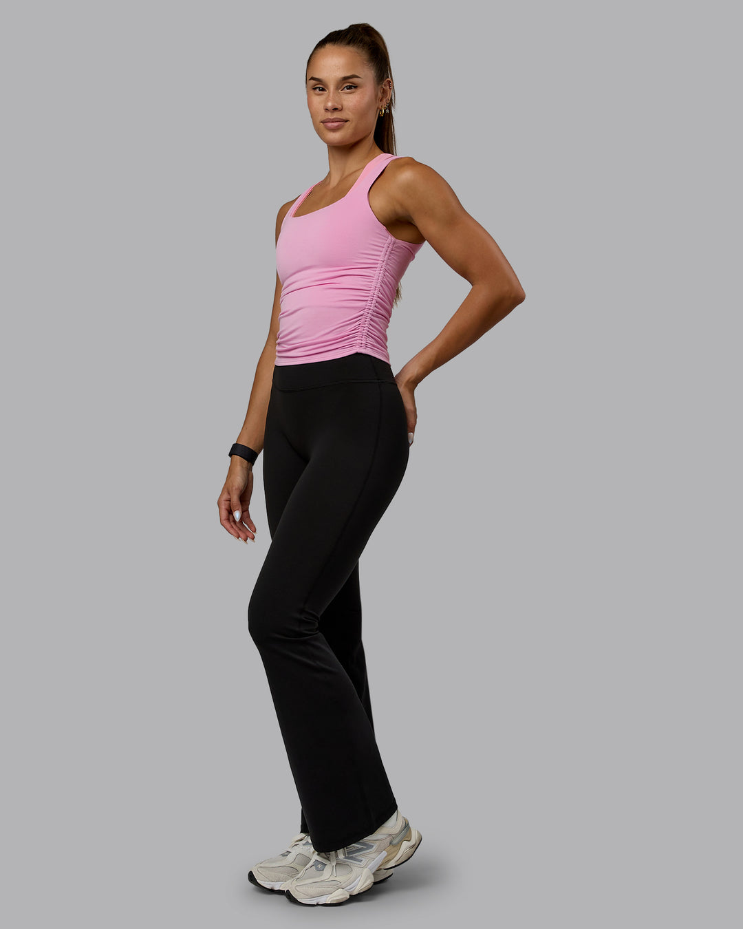 Woman wearing Ignite Scrunch Side Tank - Bubblegum