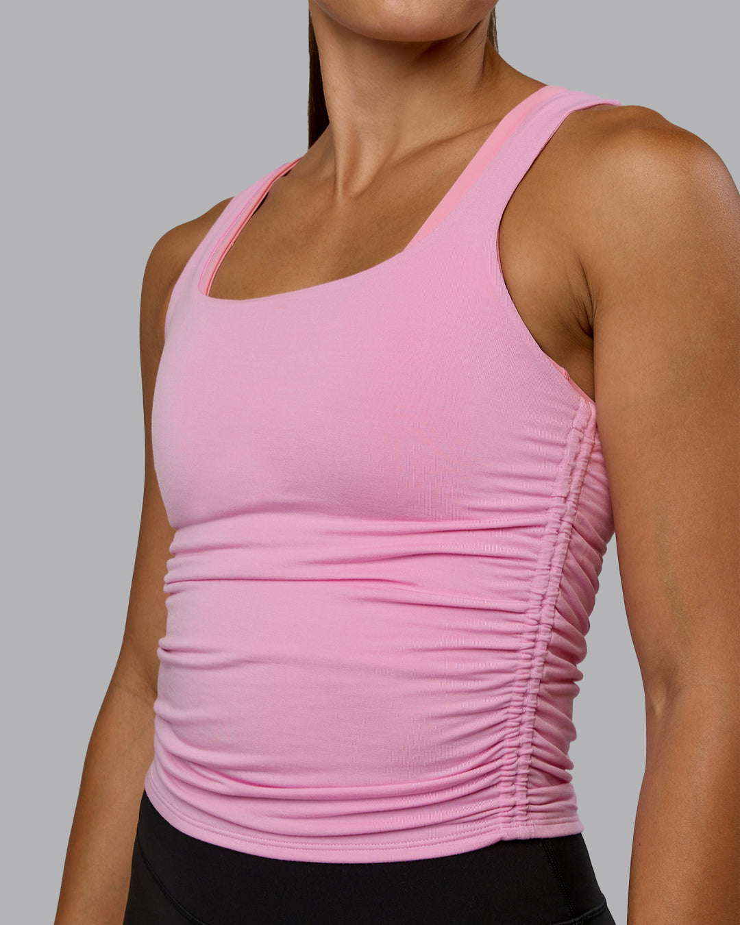 Woman wearing Ignite Scrunch Side Tank - Bubblegum