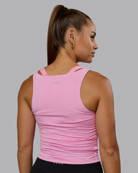 Woman wearing Ignite Scrunch Side Tank - Bubblegum