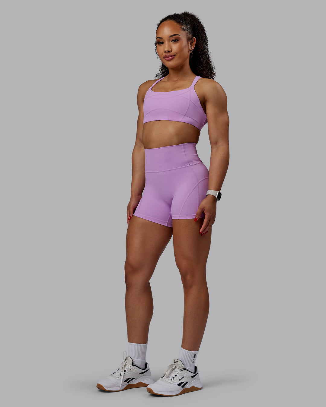 Woman wearing Inertia Sports Bra - Light Violet