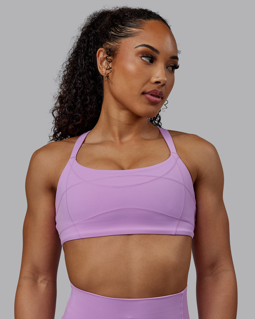 Woman wearing Inertia Sports Bra - Light Violet