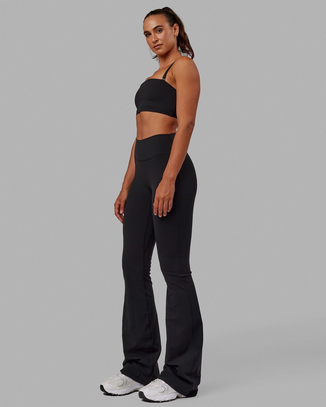 Woman wearing Inspire Sports Bra - Black