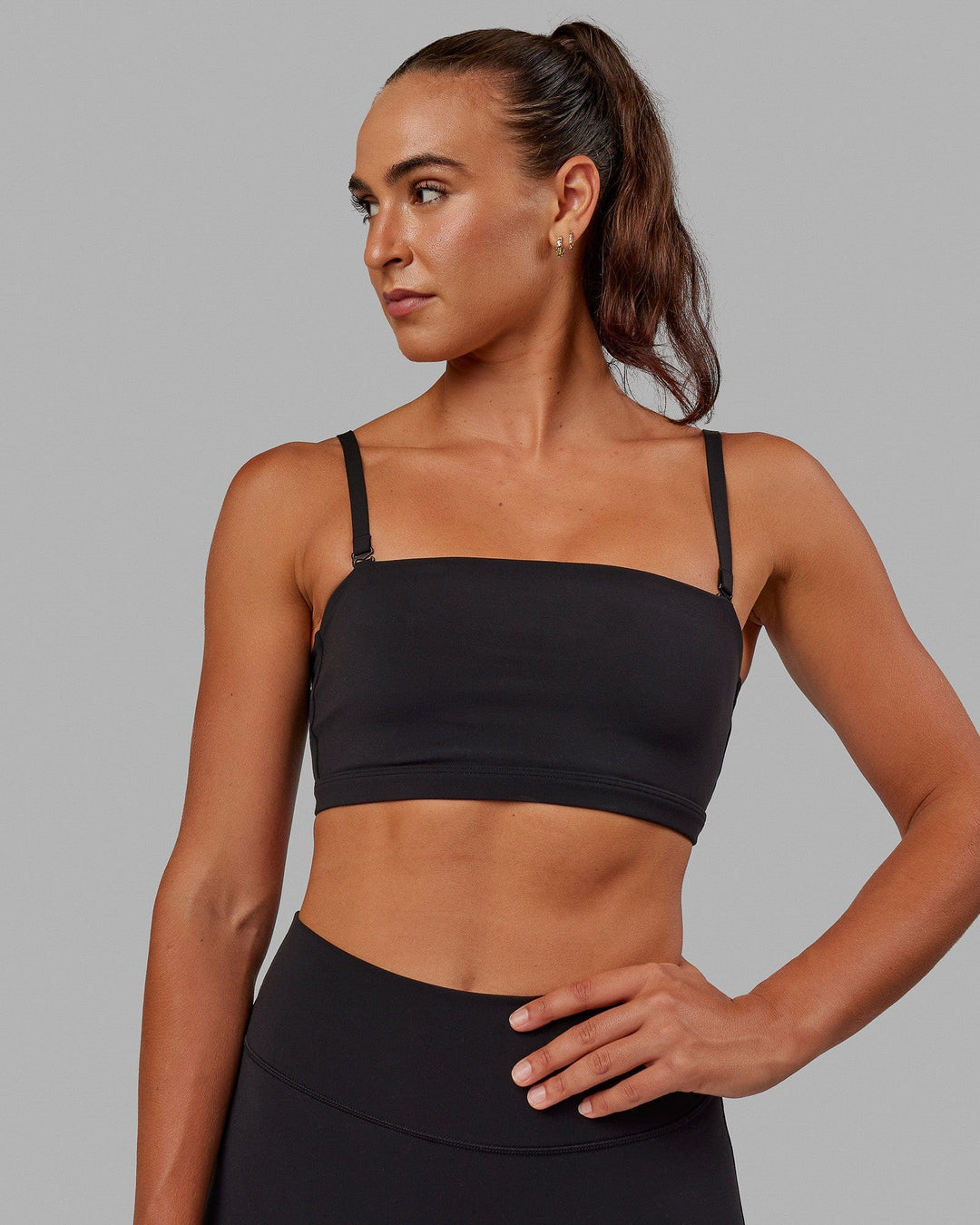 Woman wearing Inspire Sports Bra - Black