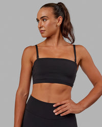 Woman wearing Inspire Sports Bra - Black