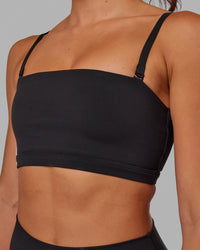Woman wearing Inspire Sports Bra - Black
