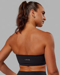 Woman wearing Inspire Sports Bra - Black