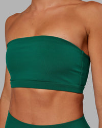 Woman wearing Inspire Sports Bra - Malachite