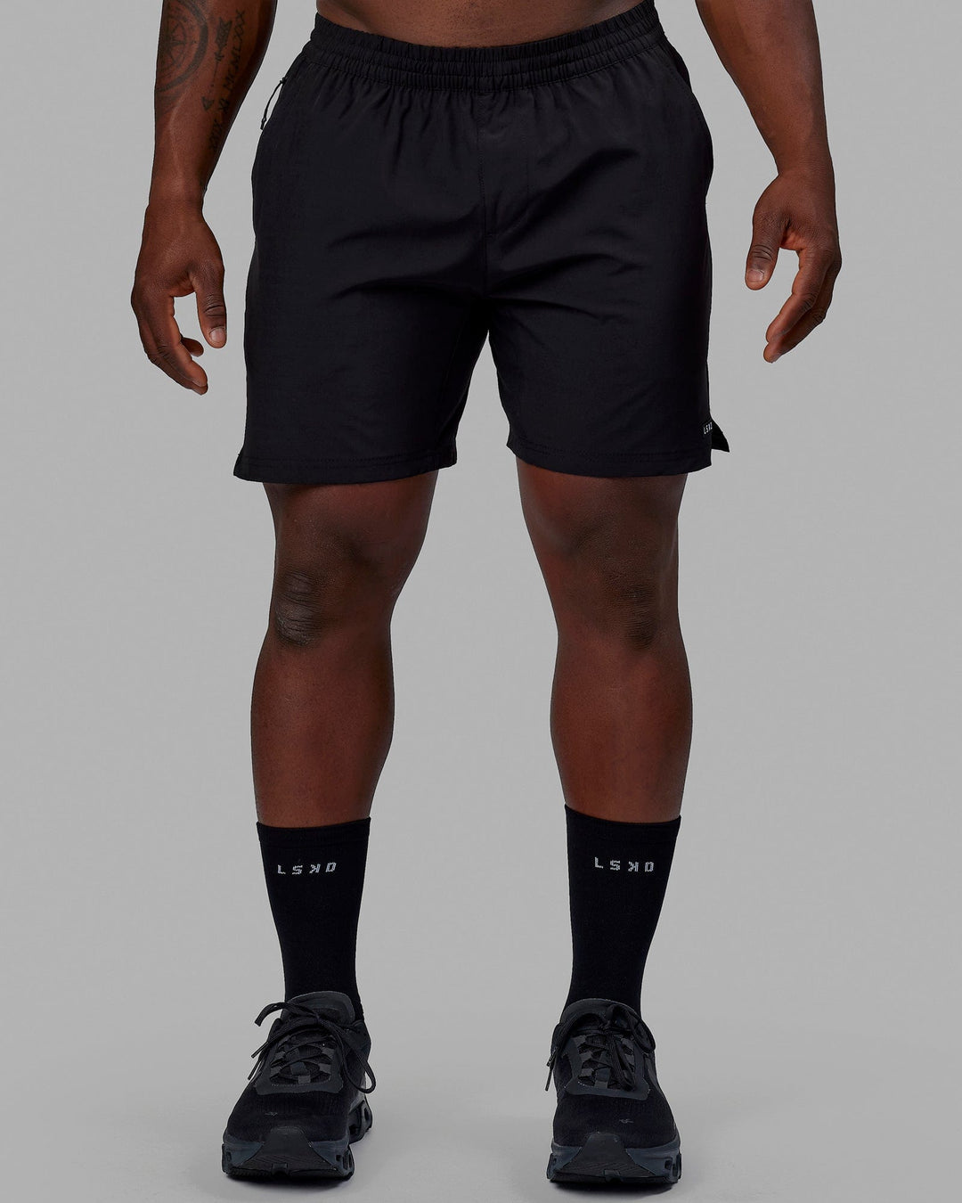 Man wearing Intensity 7" Performance Short - Black