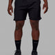 Man wearing Intensity 7" Performance Short - Black