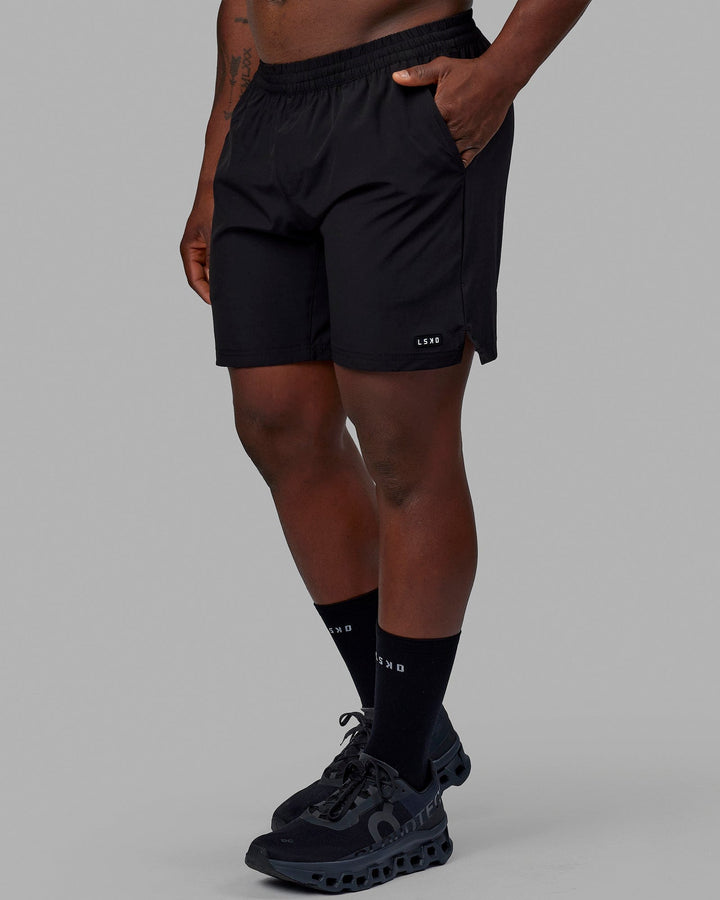 Man wearing Intensity 7" Performance Short - Black