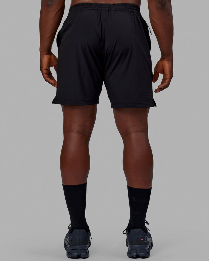 Man wearing Intensity 7" Performance Short - Black