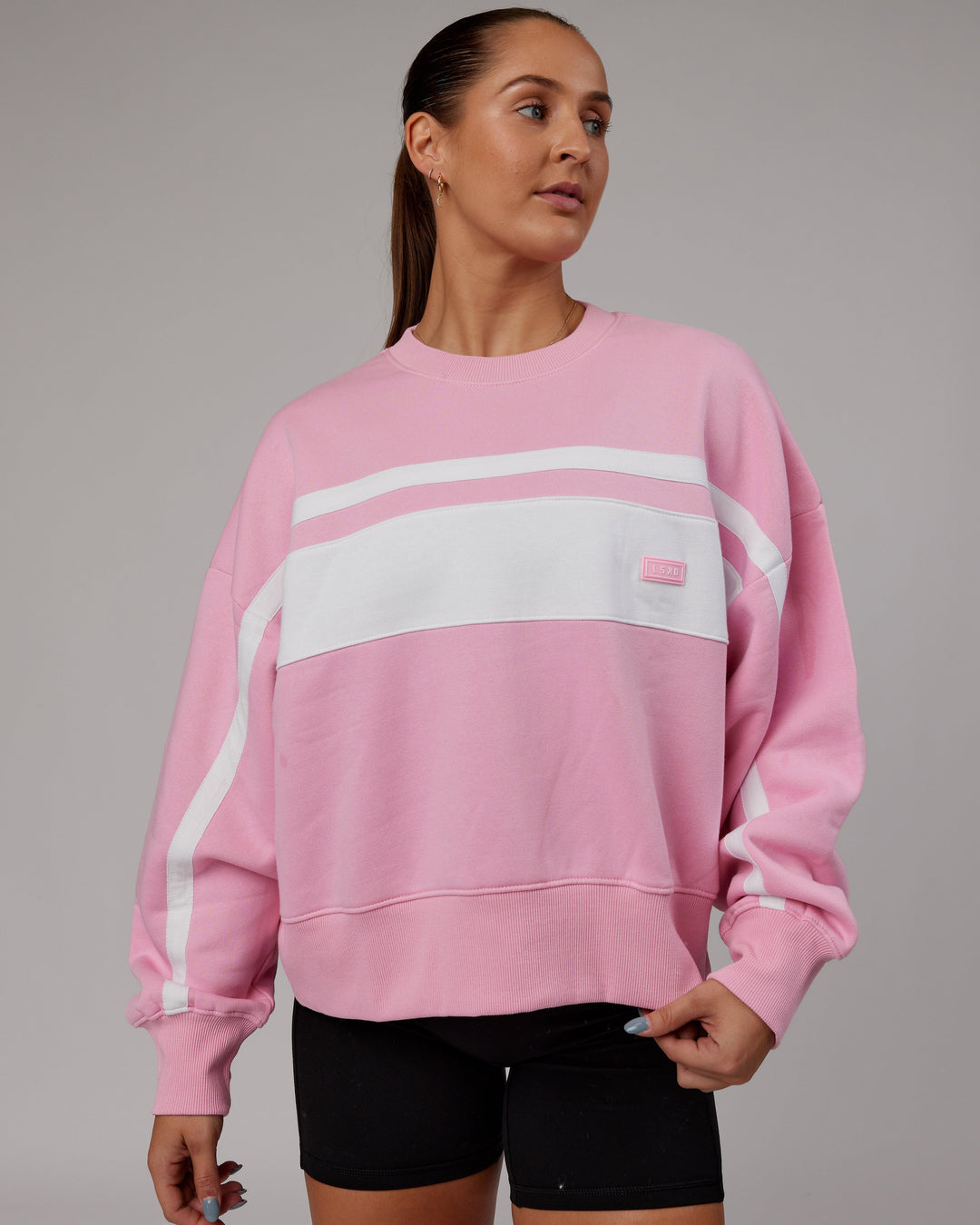 Woman wearing Intercept Sweater - Pink Frosting-White
