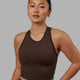 Woman wearing LHFM Tank - Dark Chocolate