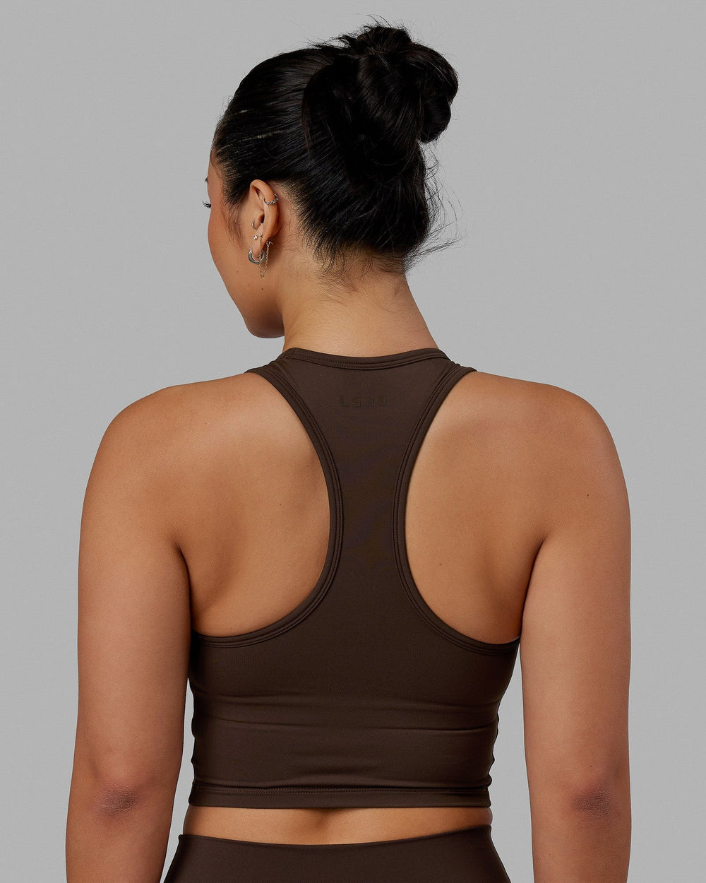 Woman wearing LHFM Tank - Dark Chocolate