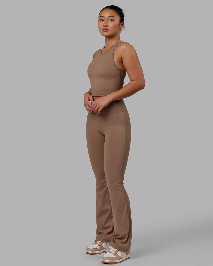 Woman wearing LHFM Tank - Doe