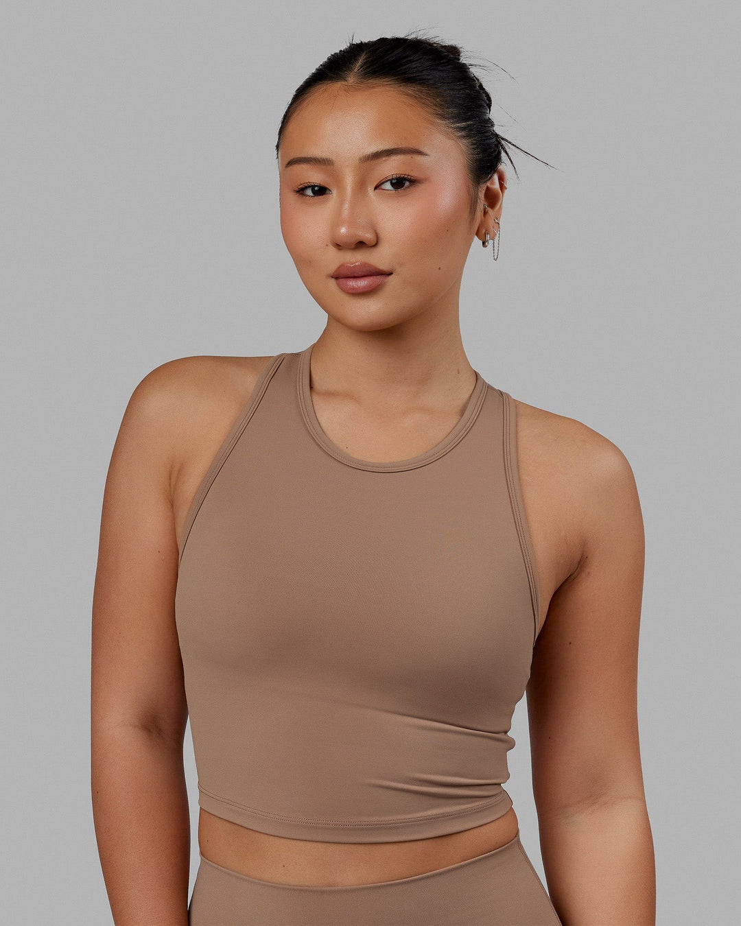 Woman wearing LHFM Tank - Doe