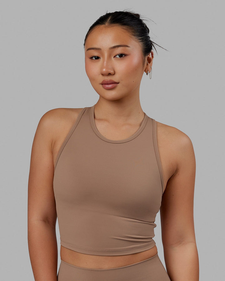 Woman wearing LHFM Tank - Doe
