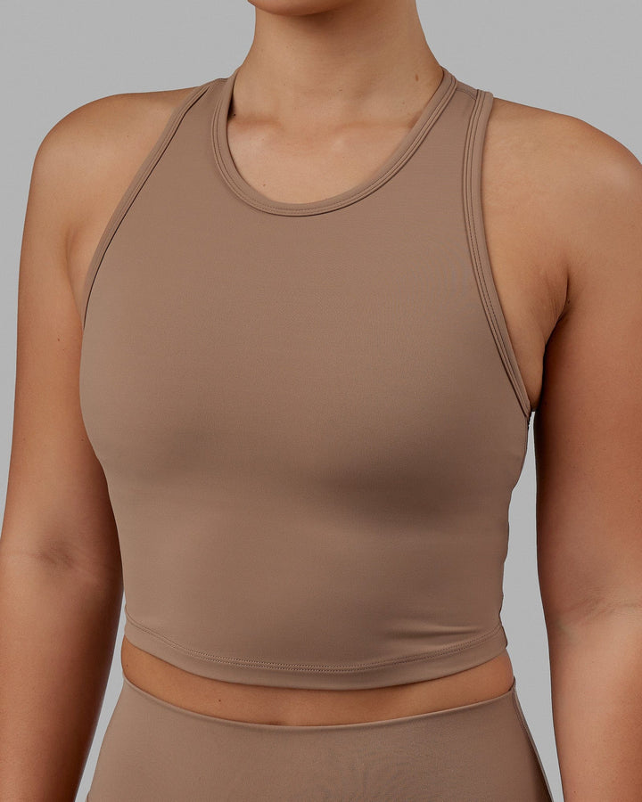 Woman wearing LHFM Tank - Doe