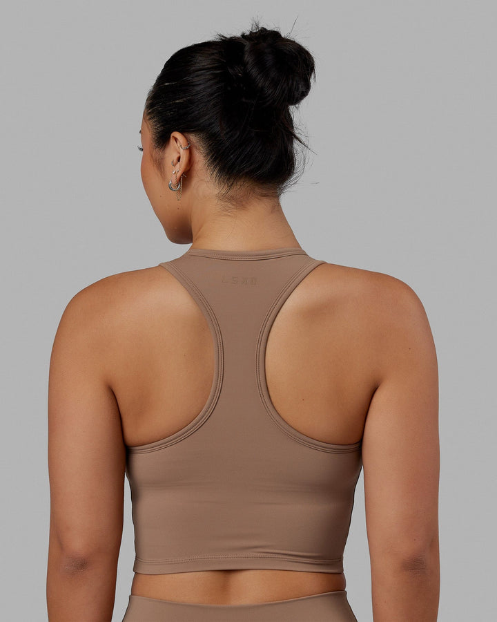 Woman wearing LHFM Tank - Doe