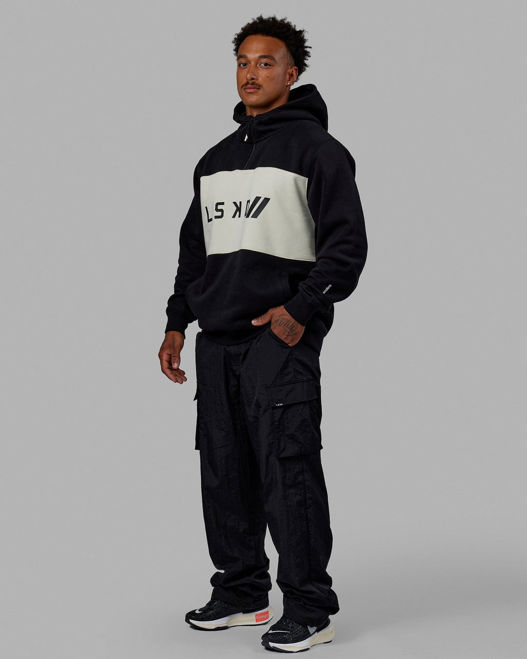 Man wearing Unisex LSKD x Blenders Hoodie - Black-Bone