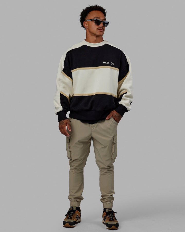 Man wearing Unisex LSKD x Blenders Sweater - Black-Bone