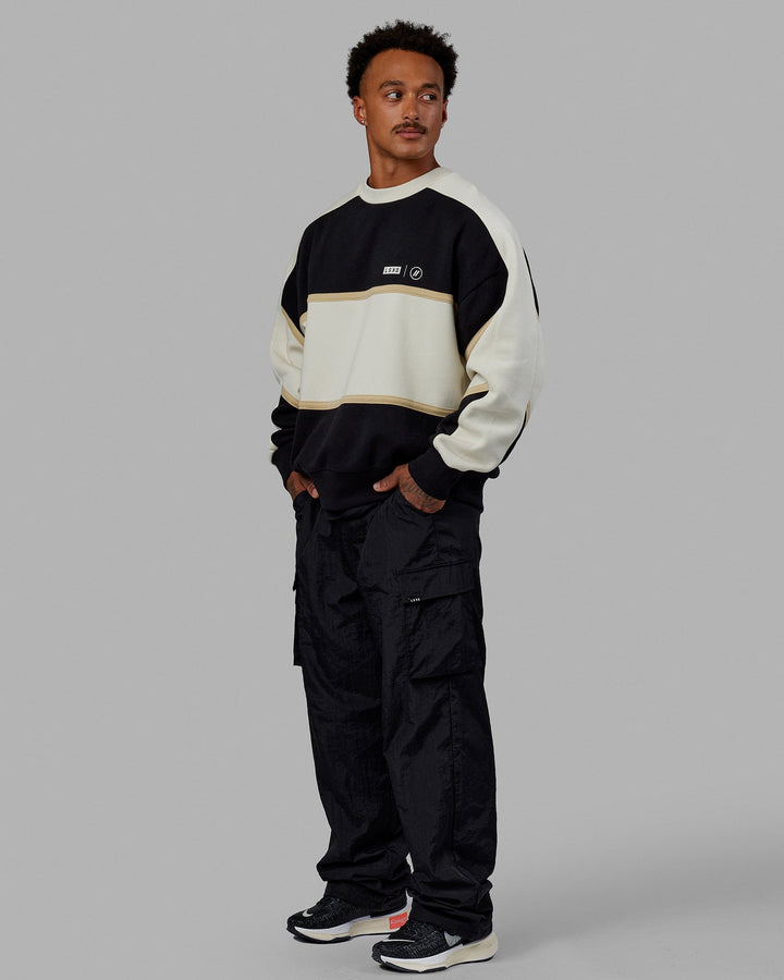 Man wearing Unisex LSKD x Blenders Sweater - Black-Bone