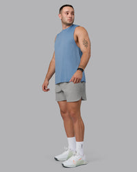 Man wearing Lift 6" Lined Performance Shorts - Circular Grey