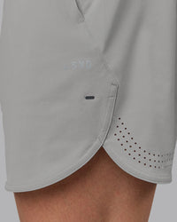 Man wearing Lift 6" Lined Performance Shorts - Circular Grey
