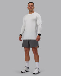 Man wearing Lift 6" Lined Performance Shorts - Dark Storm