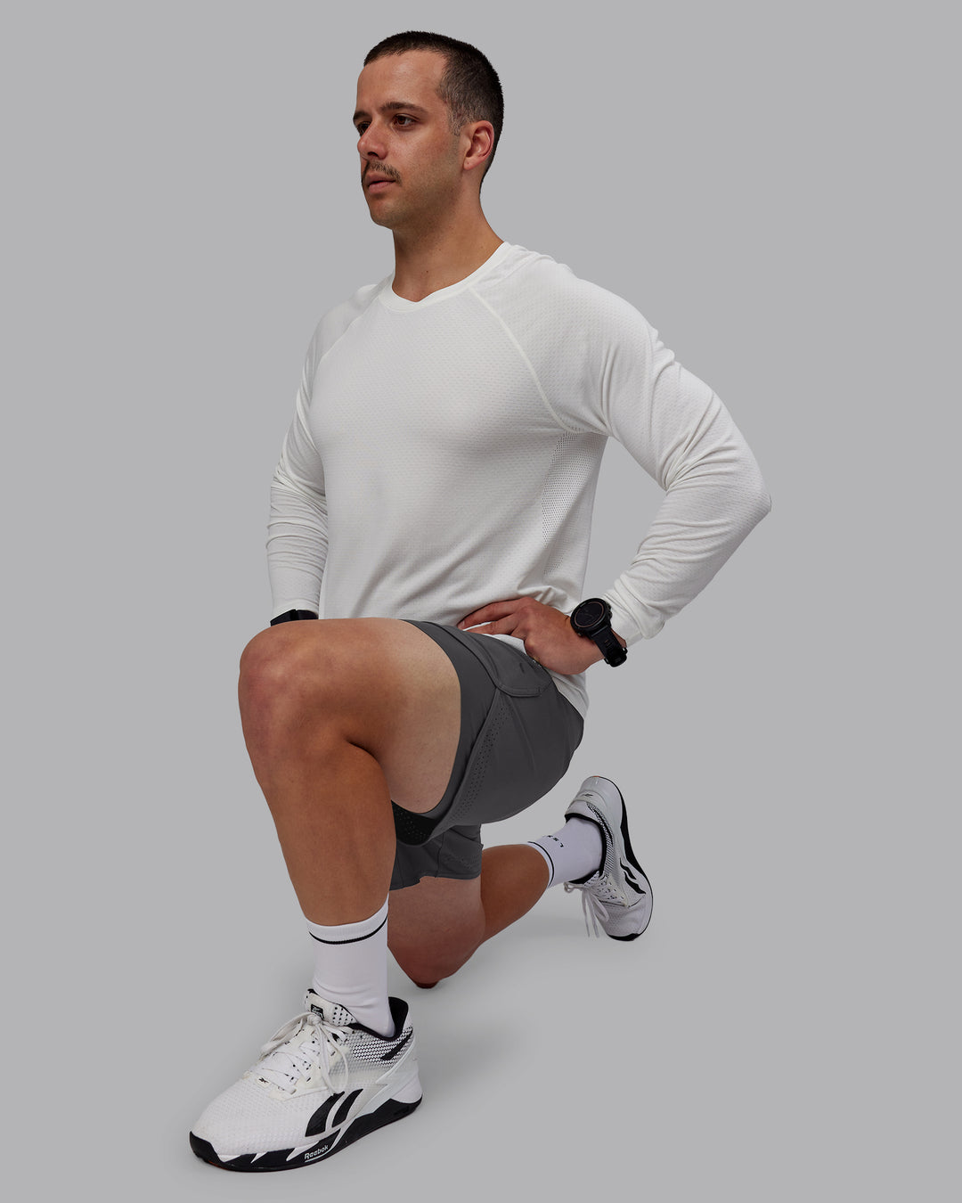 Man wearing Lift 6&quot; Lined Performance Shorts - Dark Storm