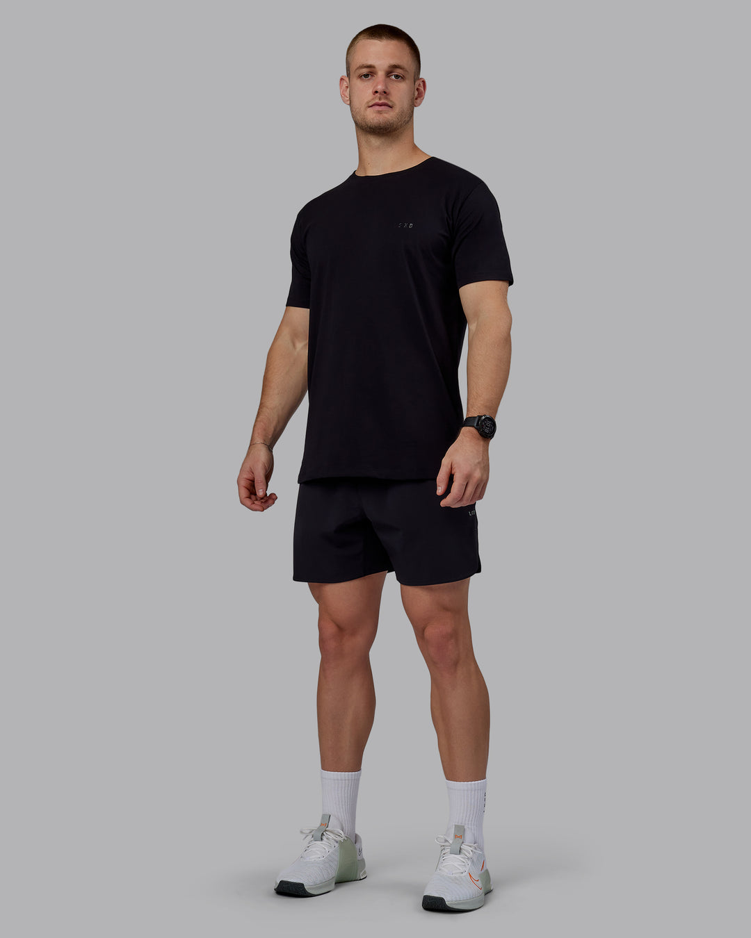 Man wearing Lift 6&quot; Performance Shorts - Black-Reflective