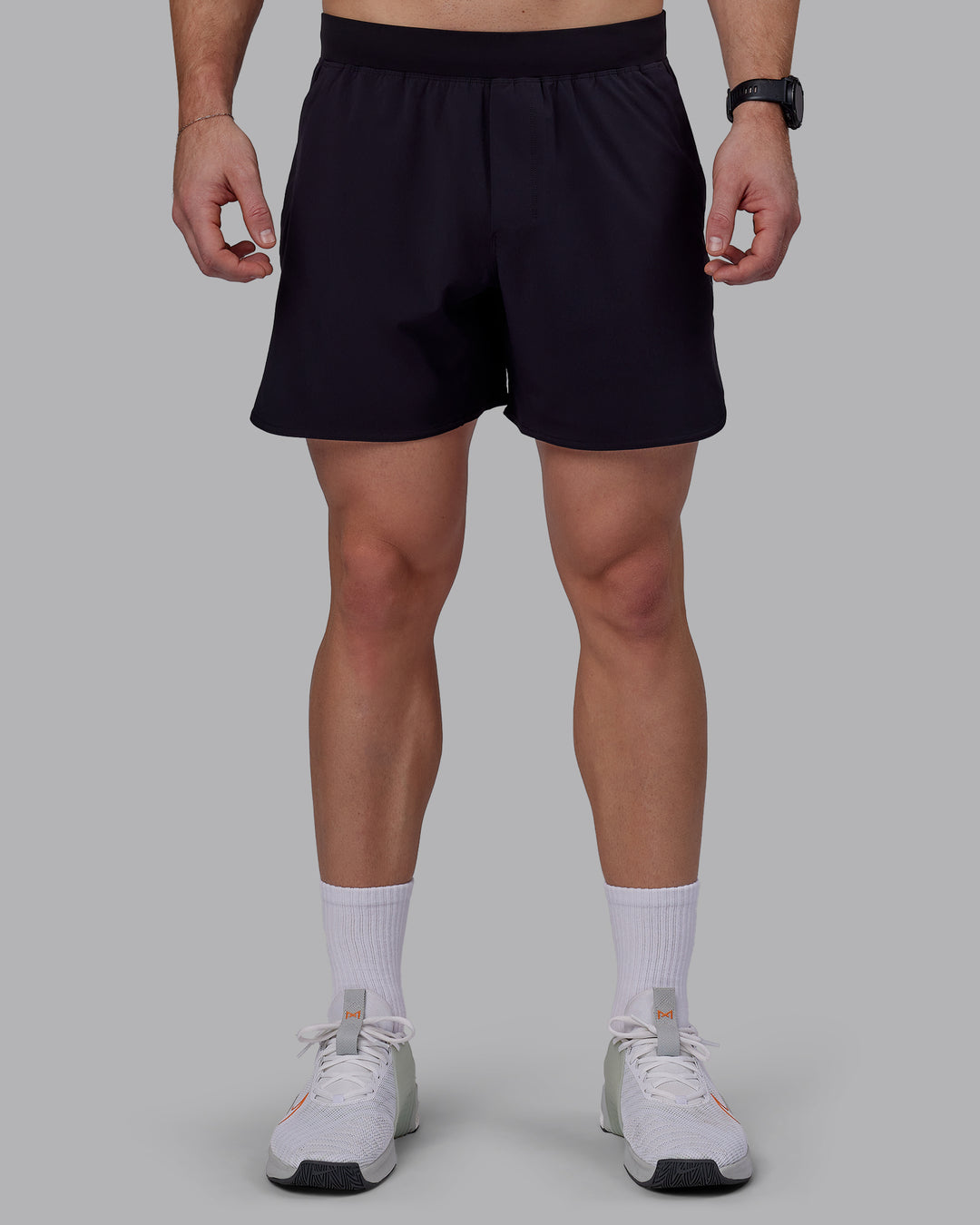 Man wearing Lift 6&quot; Performance Shorts - Black-Reflective