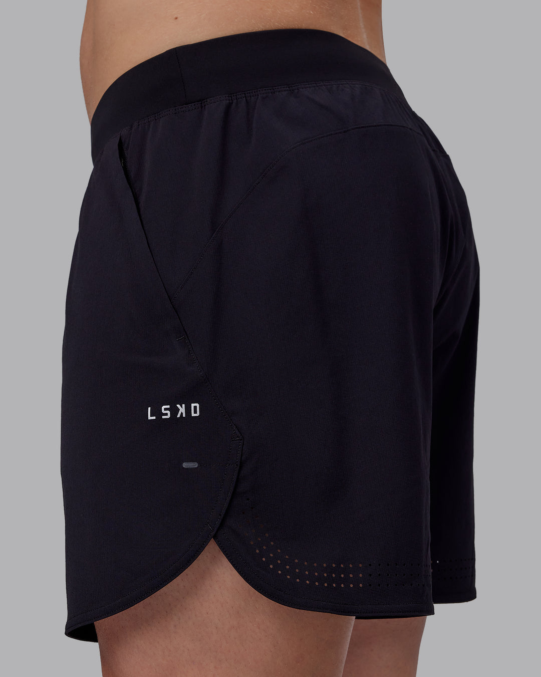 Man wearing Lift 6&quot; Performance Shorts - Black-Reflective